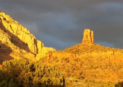 The sun rays falling on a mountain as the sun sets